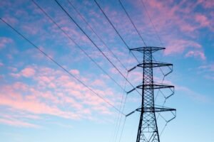 Electric Tower standing in the blue sky.