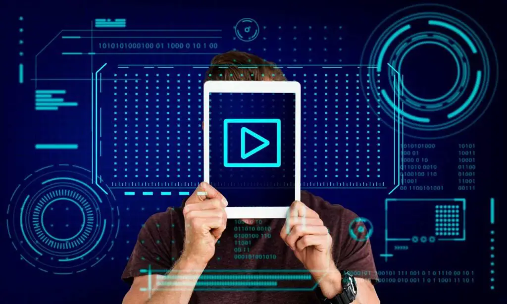 video play button in hand indicating How to Train Video Generation AI